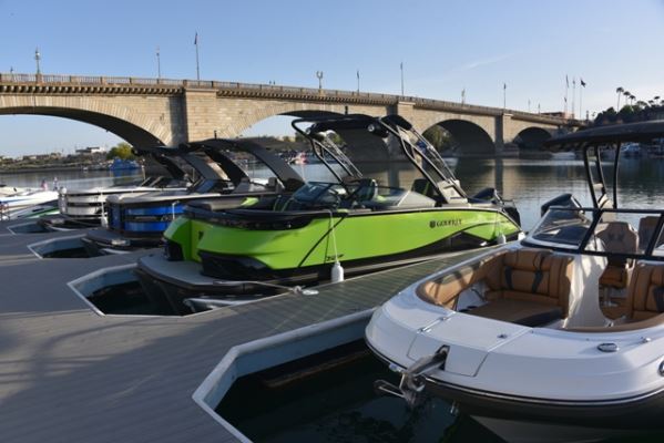 Hurricane deck boat and 2024 Godfrey XP on a green pontoon